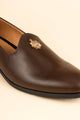 The Gold-Medallion Espresso Loafer
