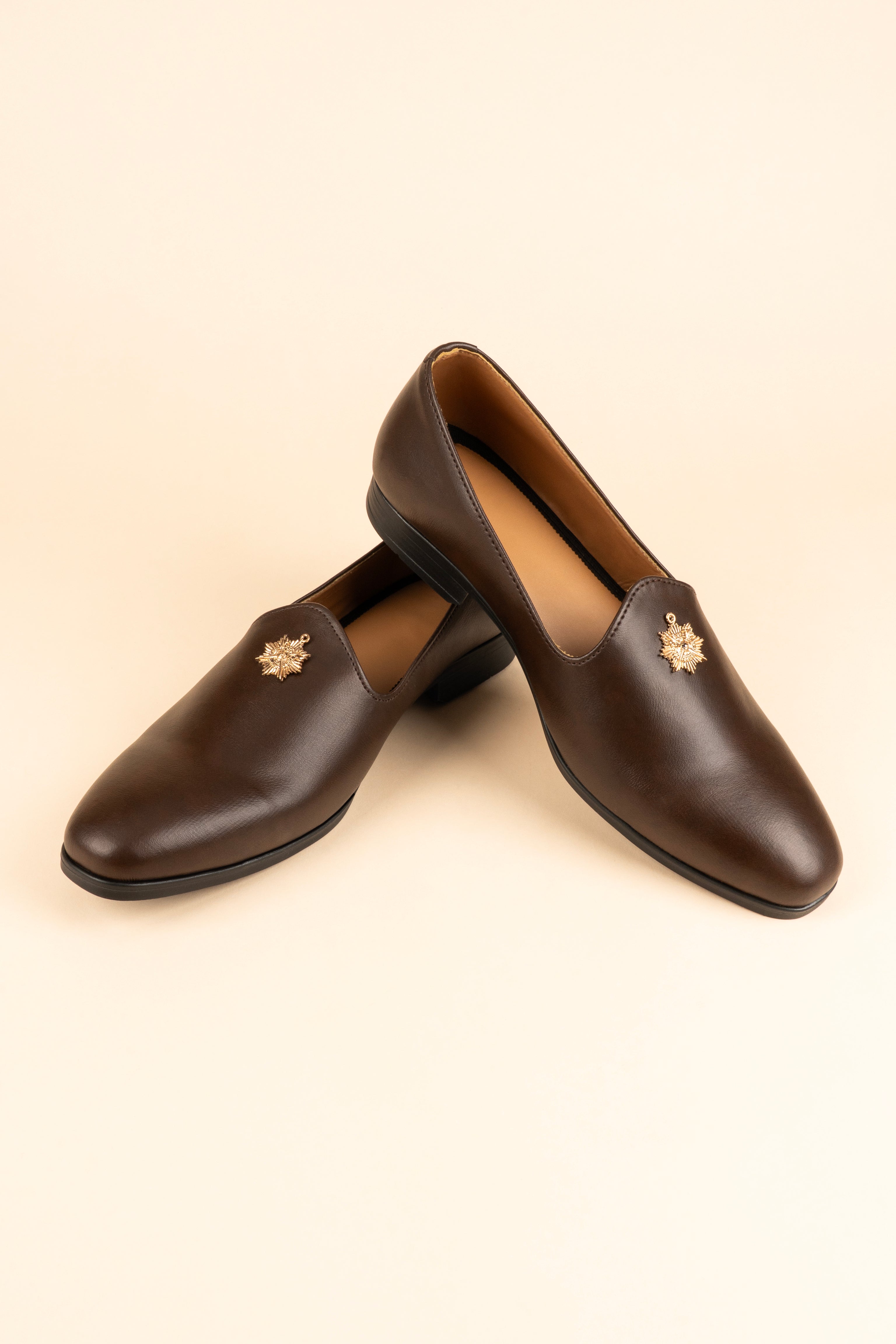 The Gold-Medallion Espresso Loafer
