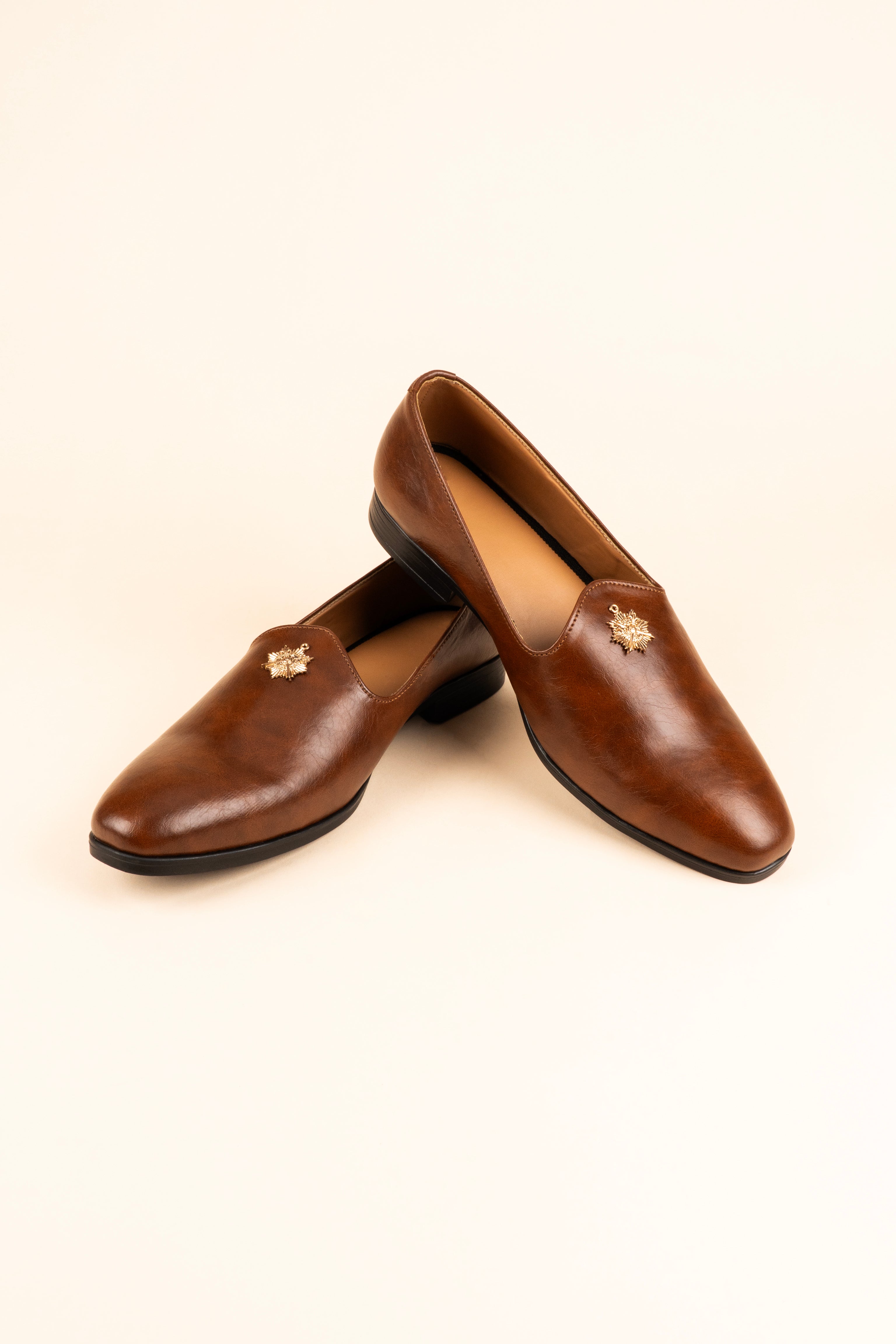 The Gold-Medallion Tan Loafer