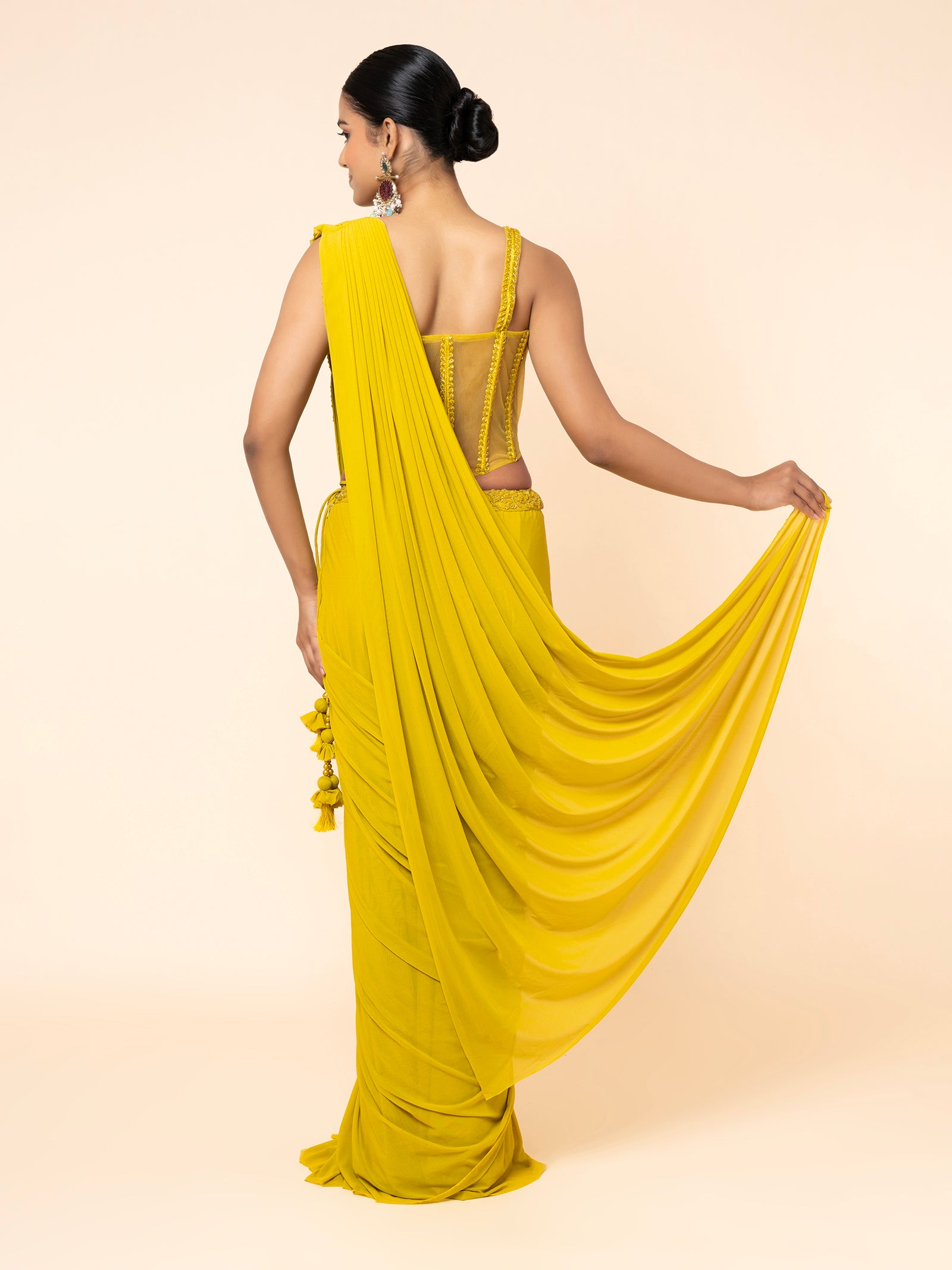 Yellow Pre-draped Saree with Embellished Corset-Style Blouse