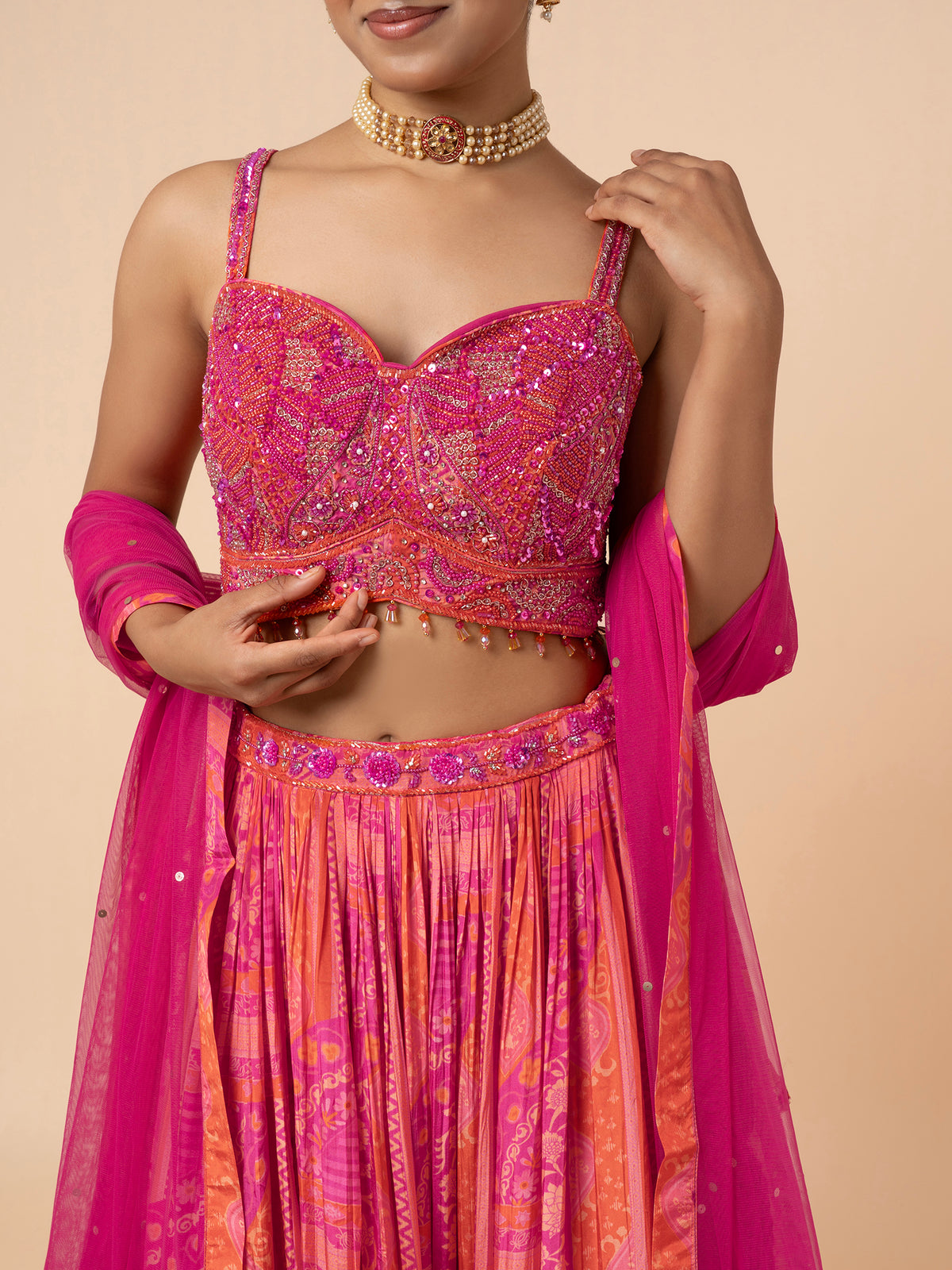 Pink and Orange Printed Lehenga with Embellished Blouse