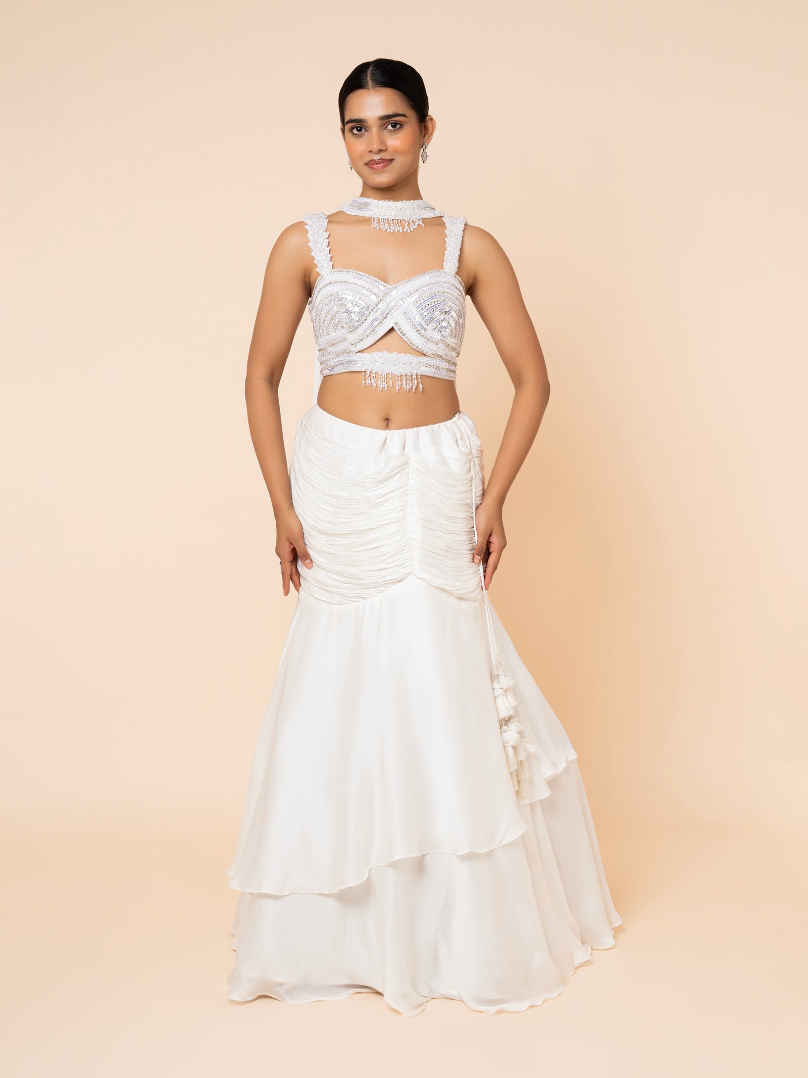 White Tiered Lehenga with Embellished Cut-out Blouse