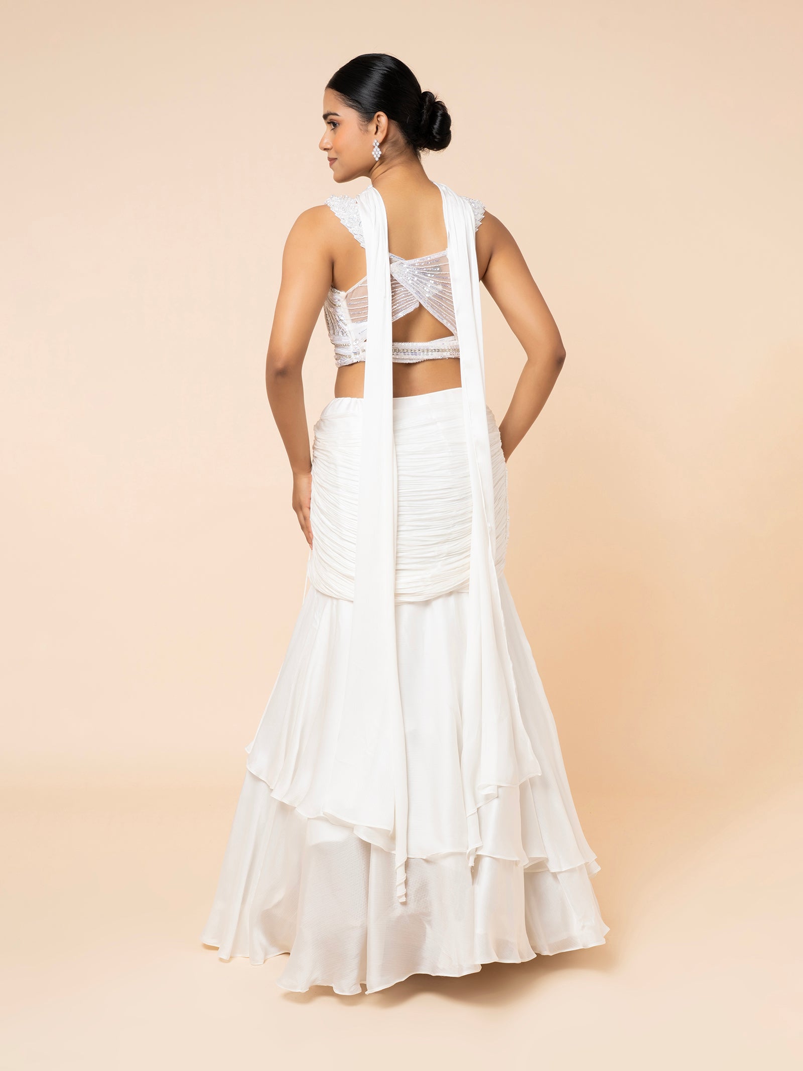 White Tiered Lehenga with Embellished Cut-out Blouse