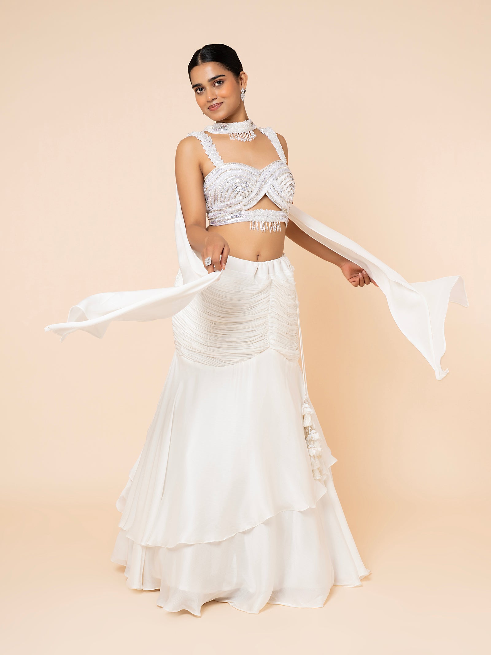 White Tiered Lehenga with Embellished Cut-out Blouse