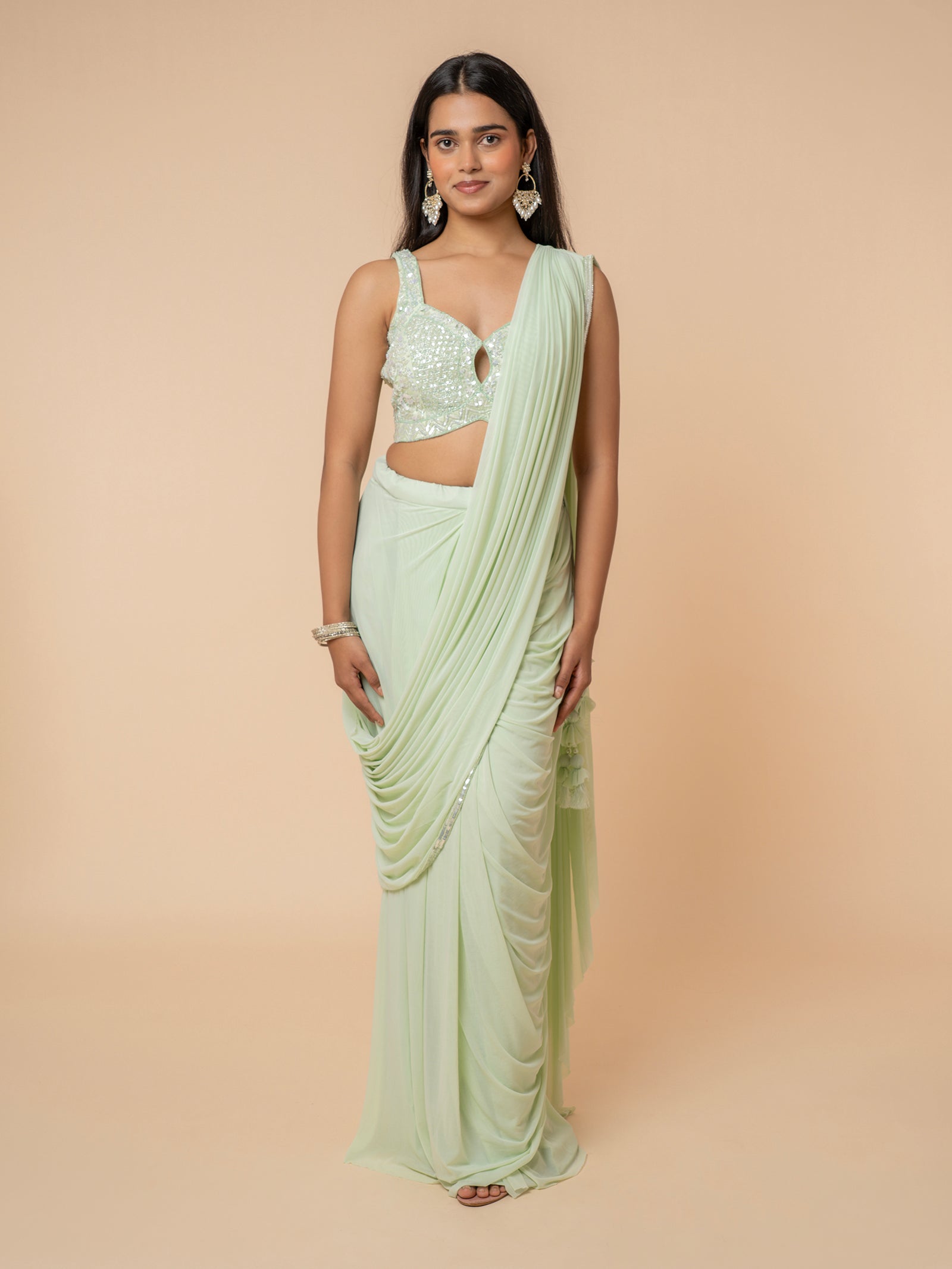 Mint Green Pre-draped Saree with Embellished Sweetheart Blouse