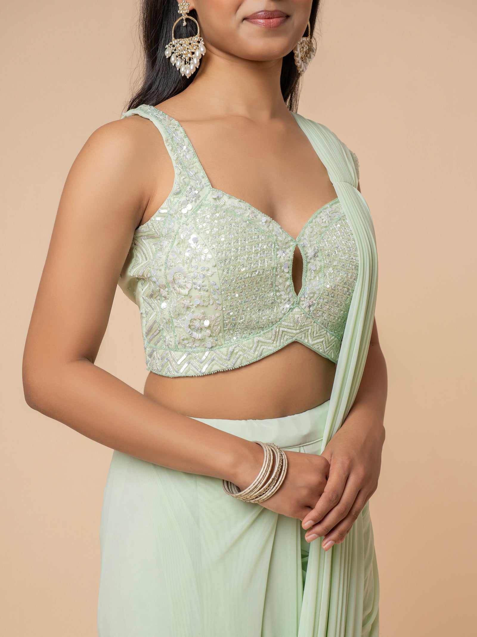 Mint Green Pre-draped Saree with Embellished Sweetheart Blouse