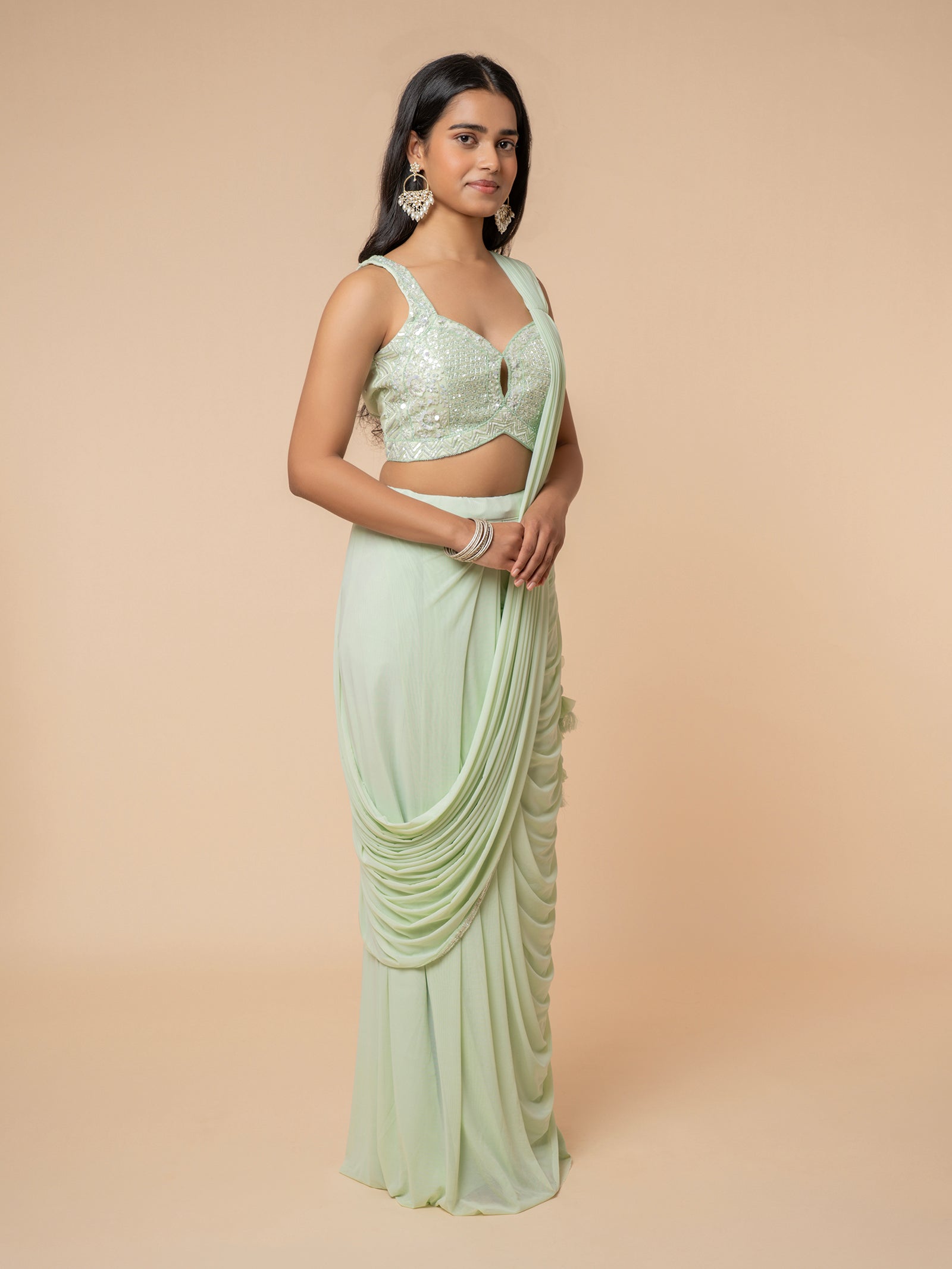 Mint Green Pre-draped Saree with Embellished Sweetheart Blouse