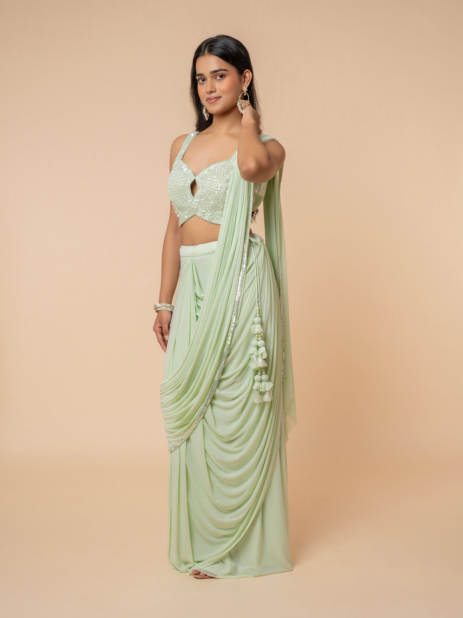Mint Green Pre-draped Saree with Embellished Sweetheart Blouse