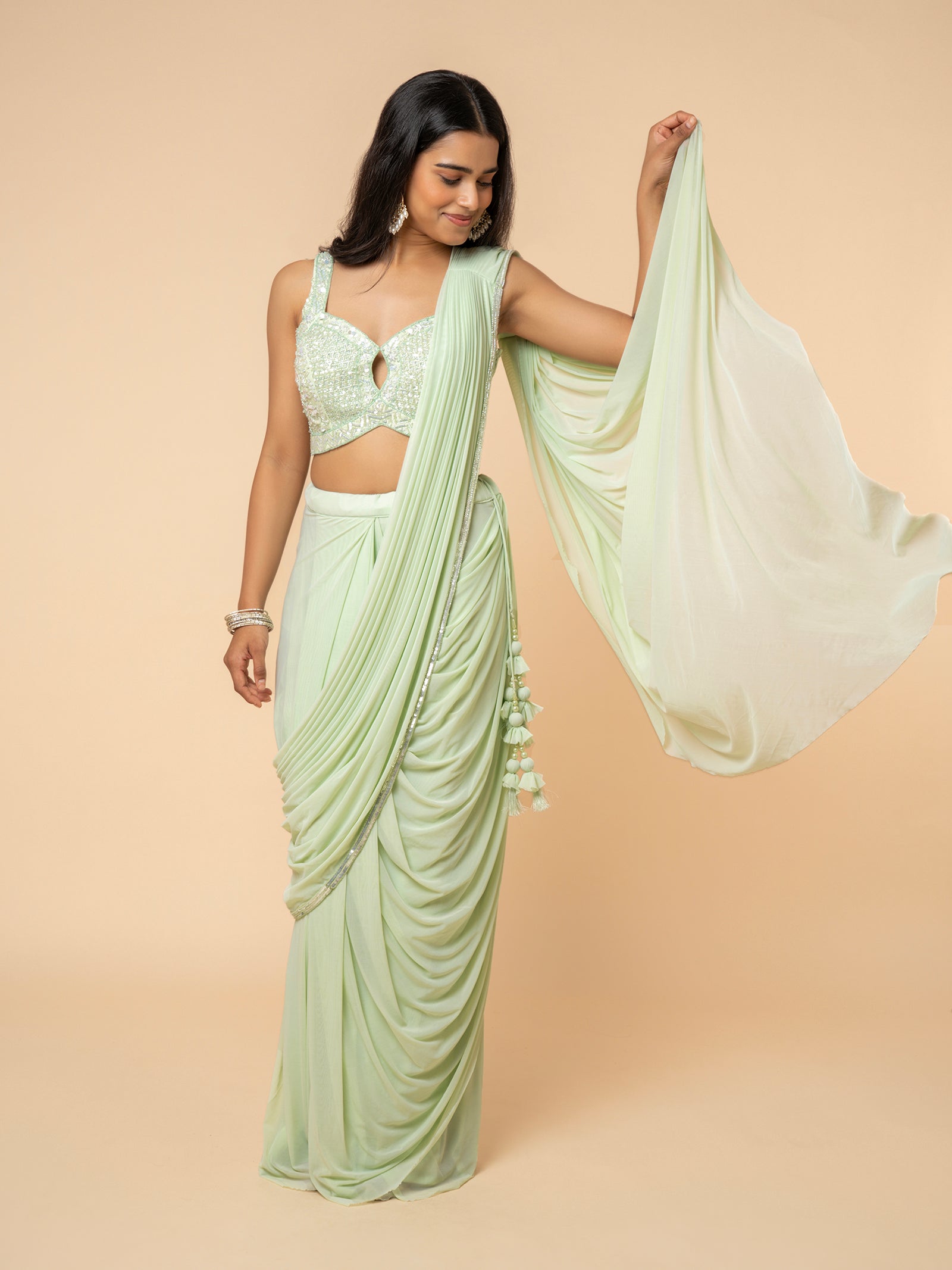 Mint Green Pre-draped Saree with Embellished Sweetheart Blouse