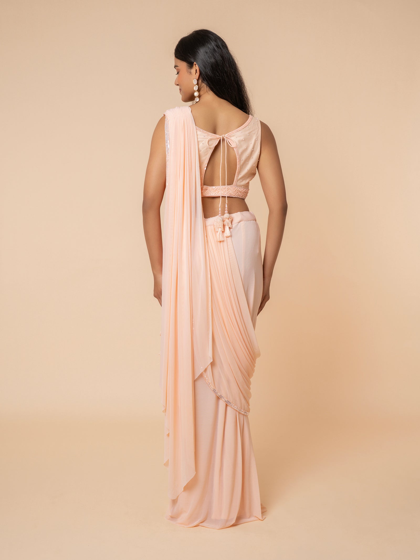 Peach Pre-draped Saree with Embellished Sweetheart Blouse
